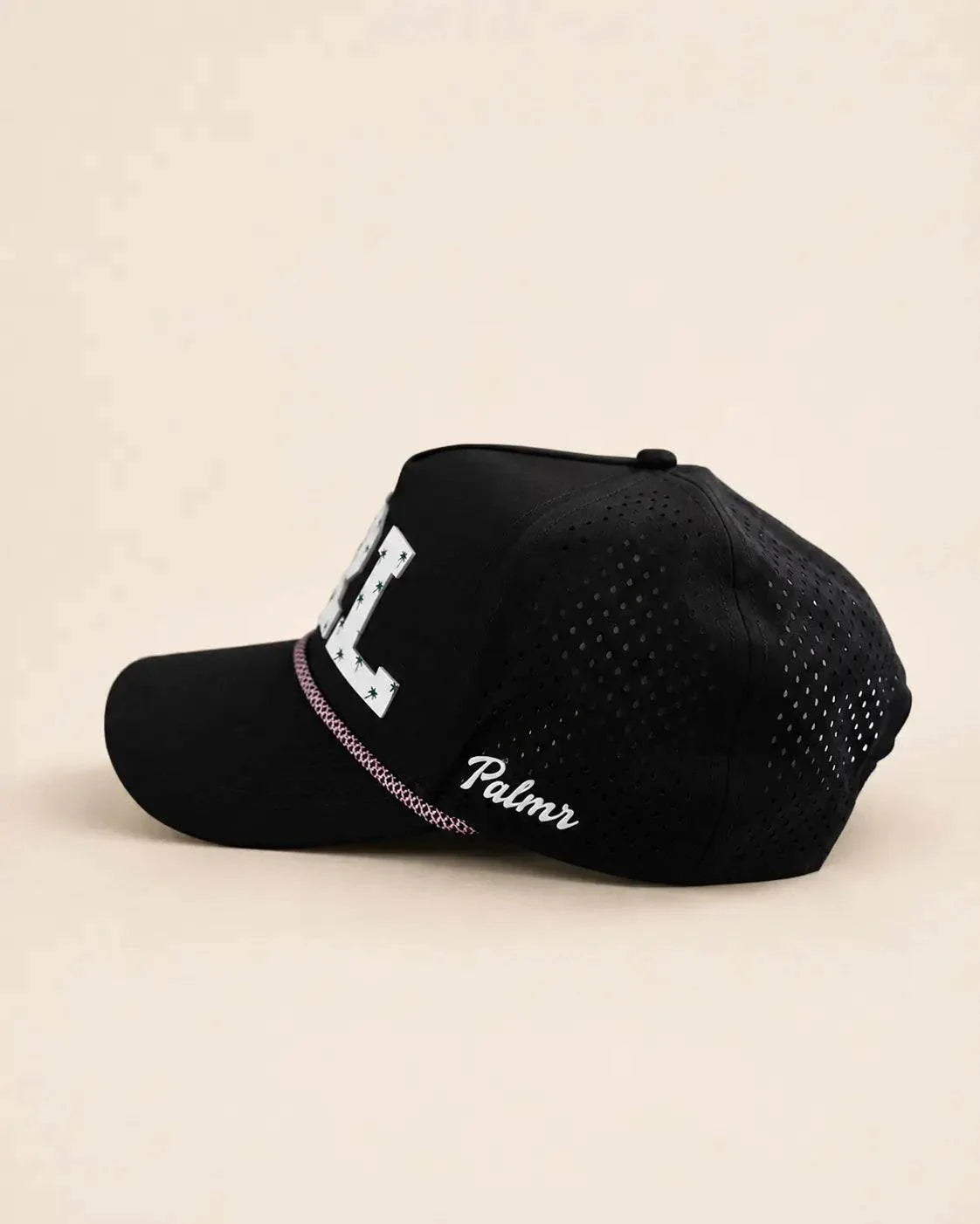 Black ORL 407 Hat with white silicone logo and palm design on structured rope cap
