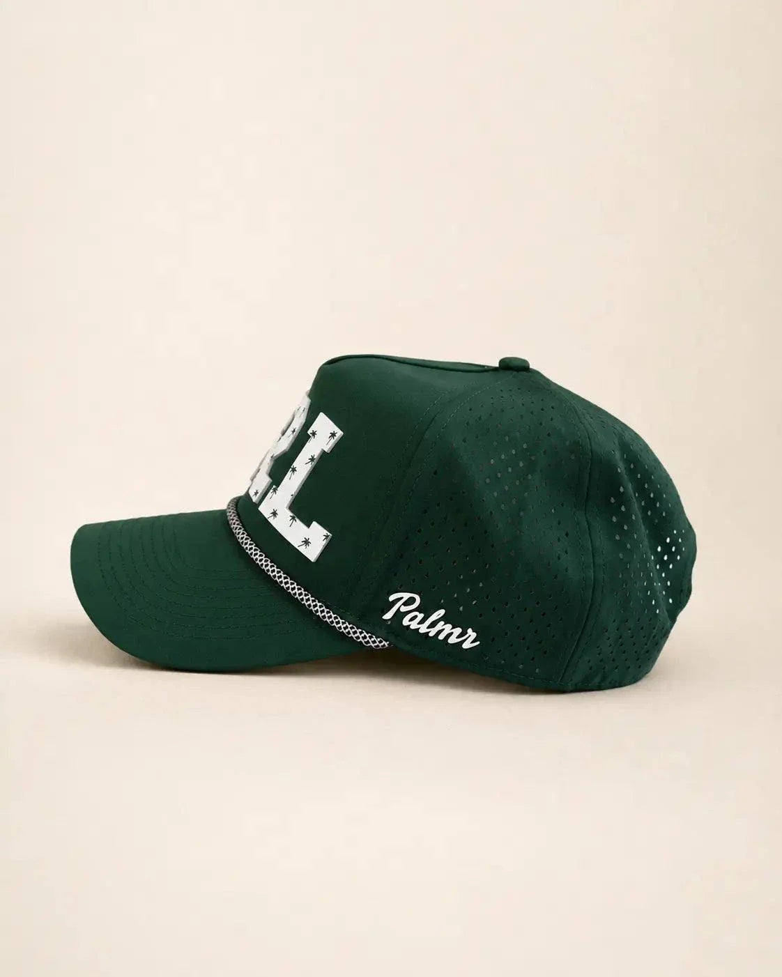 Green ORL signature hat with white raised letters and palm designs, water-resistant 407 hat for Orlando pride