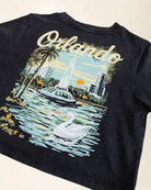 Black crop t-shirt showcasing Orlando's Owala's lake illustration