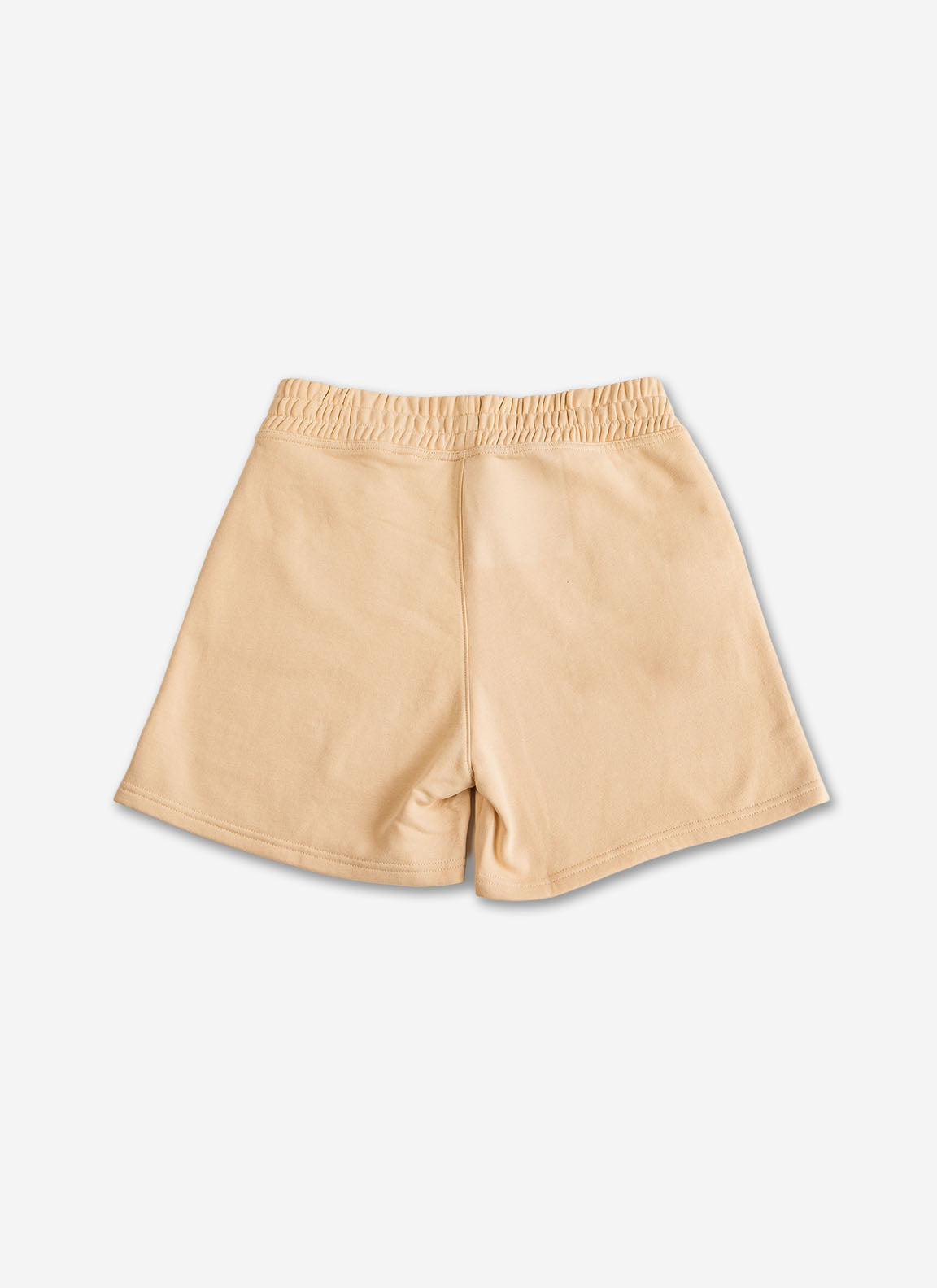 Beige shorts on a light gray background