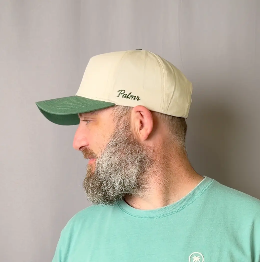 Heritage Hat fit video - cream crown with green brim, shown on-model from multiple angles.