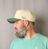 Heritage Hat fit video - cream crown with green brim, shown on-model from multiple angles.