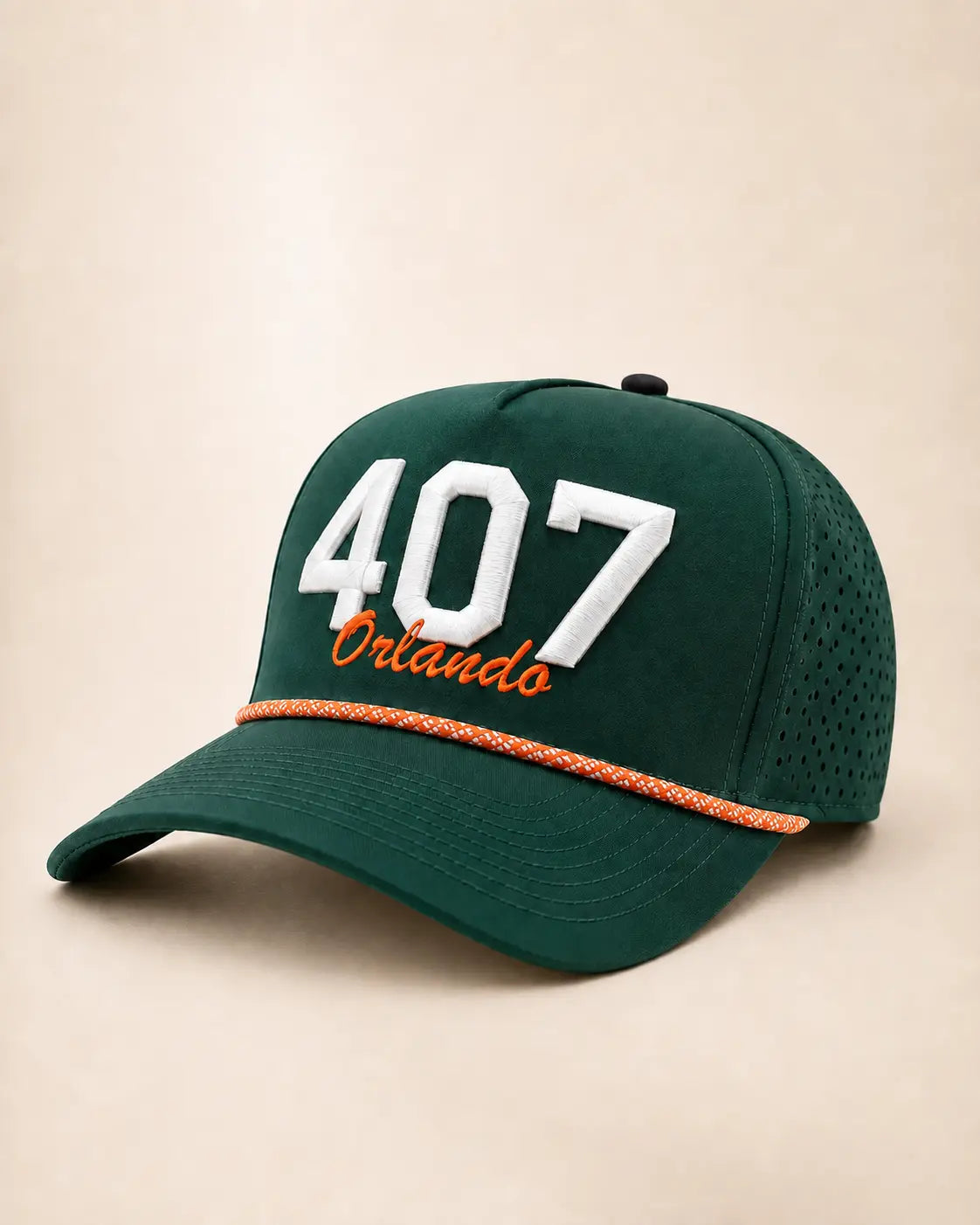 The SoDo 407 Signature Hat: white raised 407 with orange Orlando script on a dark green rope snapback, orange rope along the brim, perforated side panel.