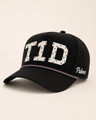 Black cap with 'T1D' and 'Palms' text on a beige background