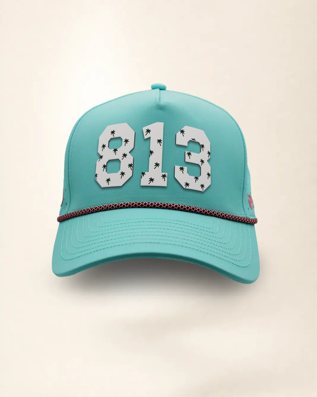 The 813 Signature Hat (Teal), front view: white raised 813 with small palm print on a teal crown, pink and black rope along the brim.