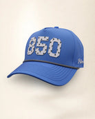 The 850 Signature Hat (Blue), three-quarter view: white raised 850 with small palm print on a blue rope snapback, black and white rope, white Palmr script.
