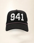 The 941 Signature Hat (Black), front view: white raised 941 with small palm print on a black crown, pink and white rope along the brim.