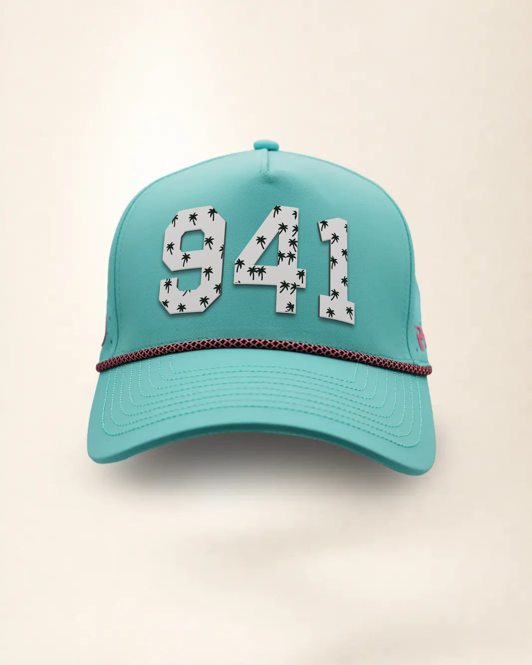 The 941 Signature Hat (Teal), front view: white raised 941 with small palm print on a teal crown, pink and black rope along the brim.